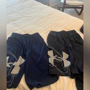 Two pairs of Under Armour shorts size YMD